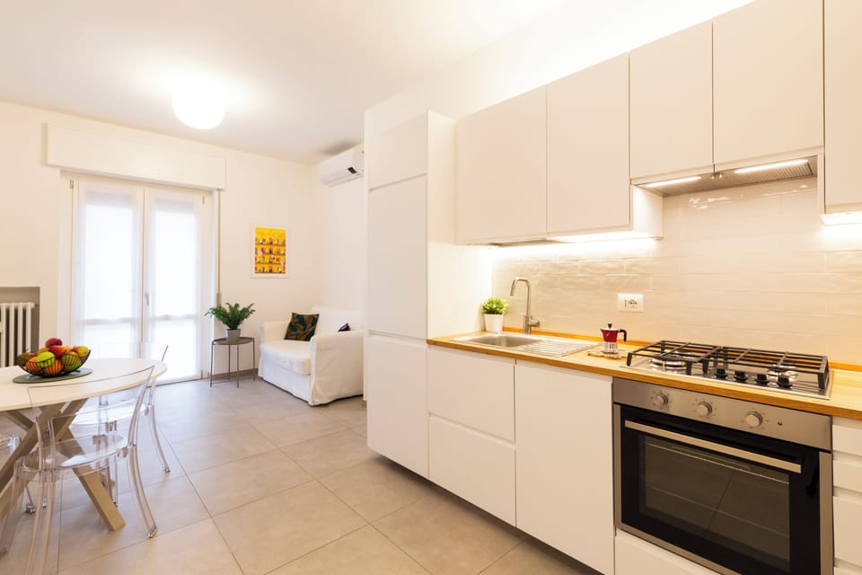Panoramic Condo | Living area | 32-inch flat-screen TV with digital channels