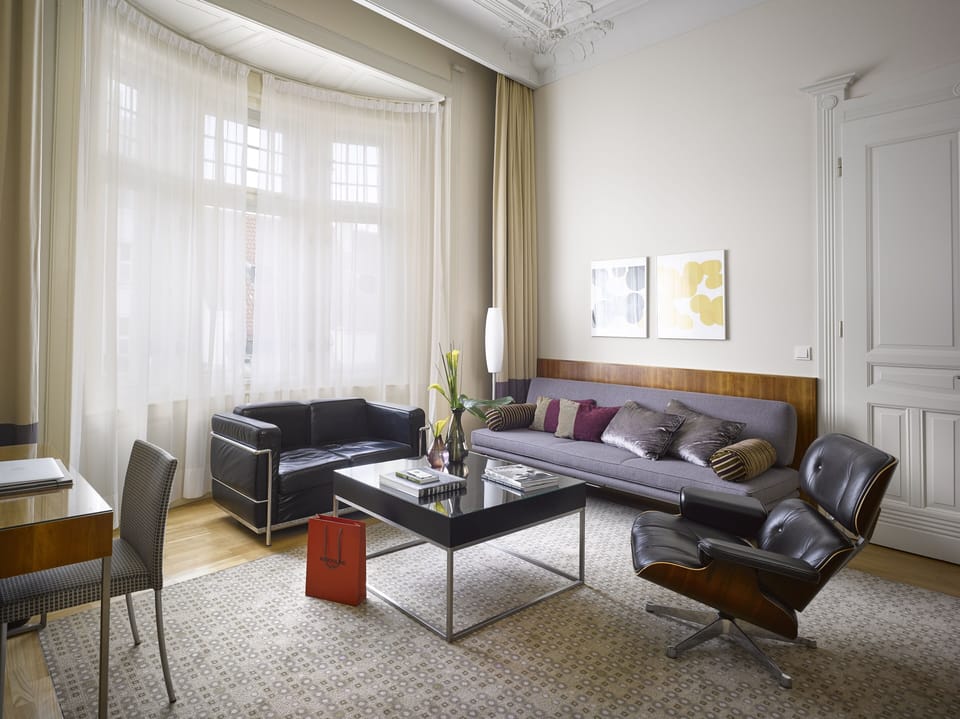 Suite | Living area | 101-cm LCD TV with satellite channels, TV