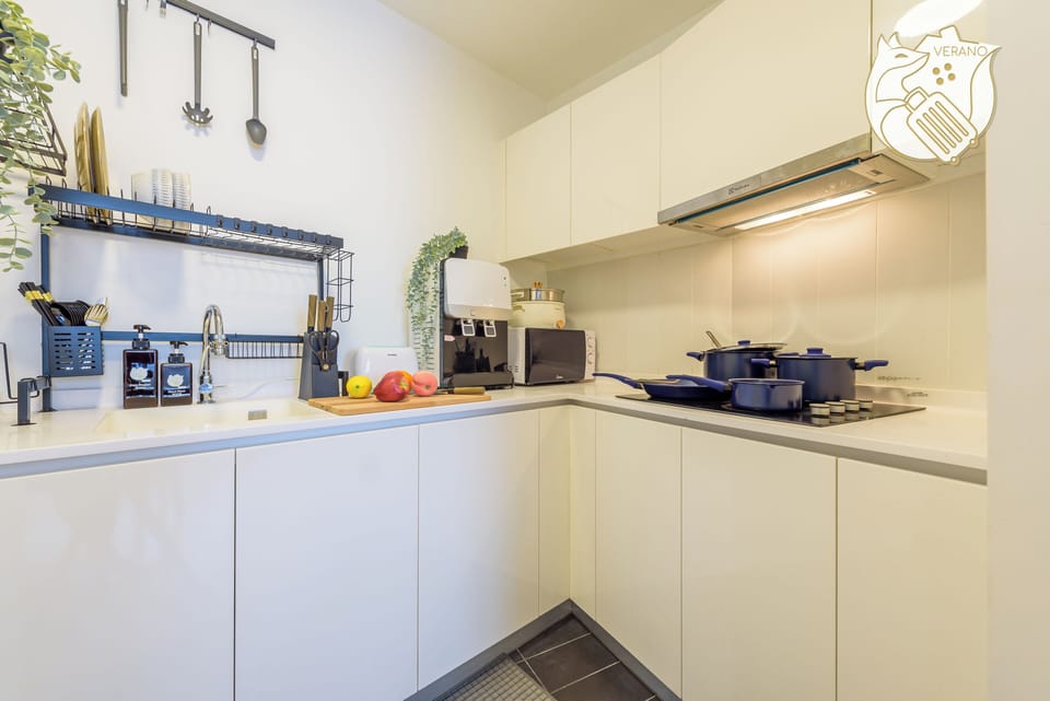 Fridge, microwave, toaster, dining table