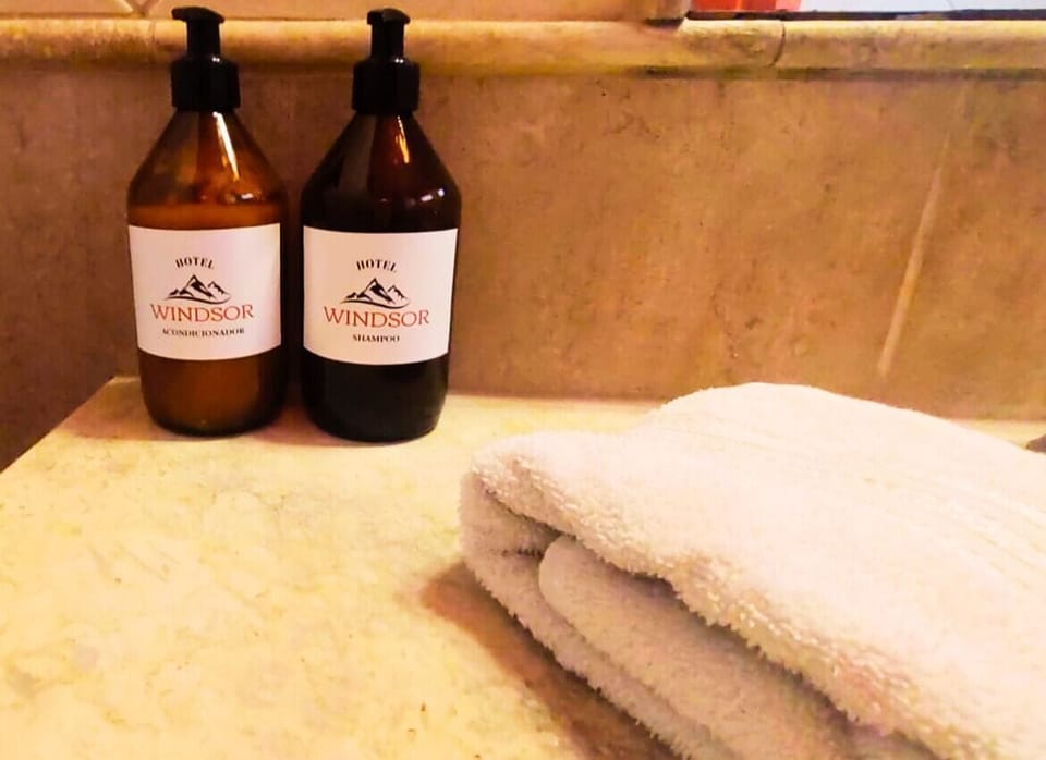 Family Duplex, Multiple Beds, City View | Bathroom | Shower, rainfall showerhead, eco-friendly toiletries, towels
