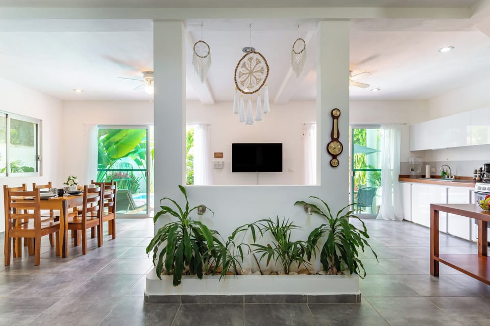 Family House | Living area | 50-inch Smart TV with digital channels
