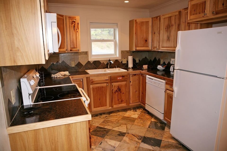 Condo, 2 Bedrooms | Private kitchen | Coffee/tea maker, fridge, oven, toaster