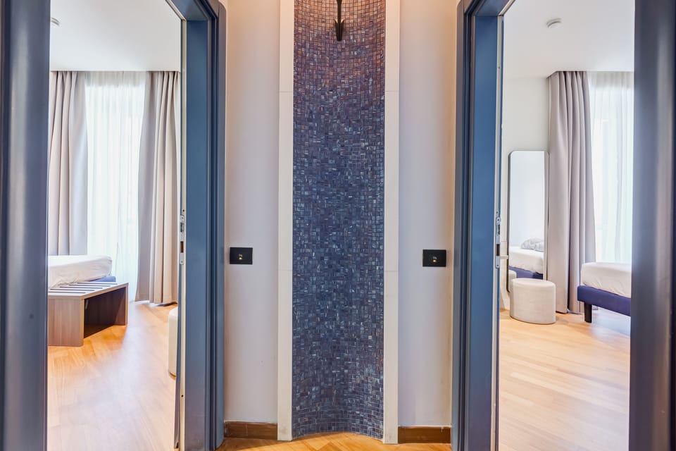Family Room, Multiple Beds | Minibar, in-room safe, desk, soundproofing