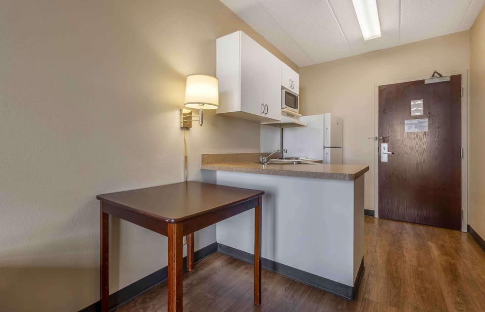 Studio, 1 Queen Bed, Non Smoking | Private kitchen | Fridge, microwave, stovetop, coffee/tea maker