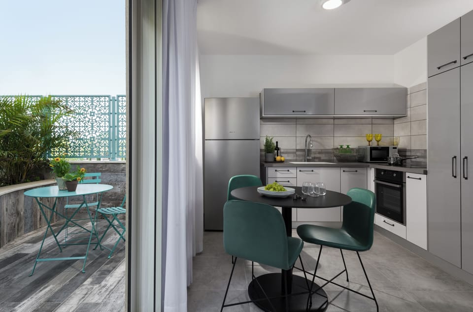 Comfort Apartment | Private kitchen | Full-size fridge, oven, stovetop