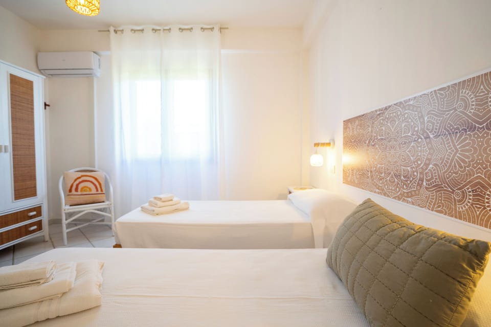 Deluxe Apartment, 2 Bedrooms, Terrace, Sea View | 2 bedrooms, WiFi (free), bed sheets