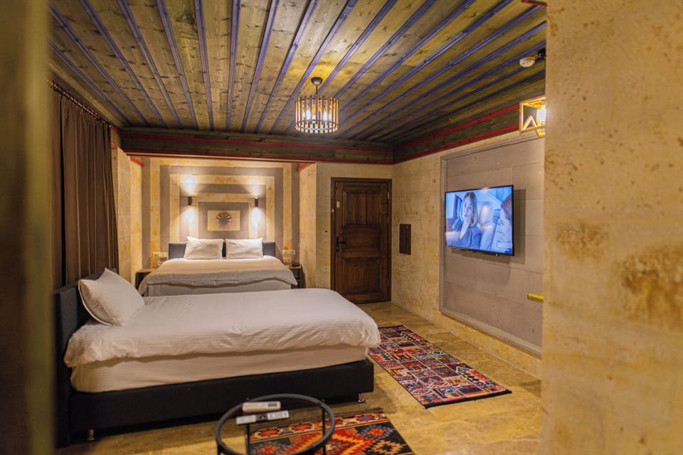 Family Triple Room, Multiple Beds, Courtyard View | Egyptian cotton sheets, premium bedding, minibar, laptop workspace