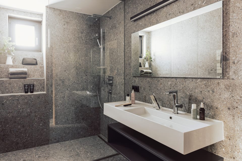 Quadruple Room | Bathroom | Shower, hair dryer, towels, soap