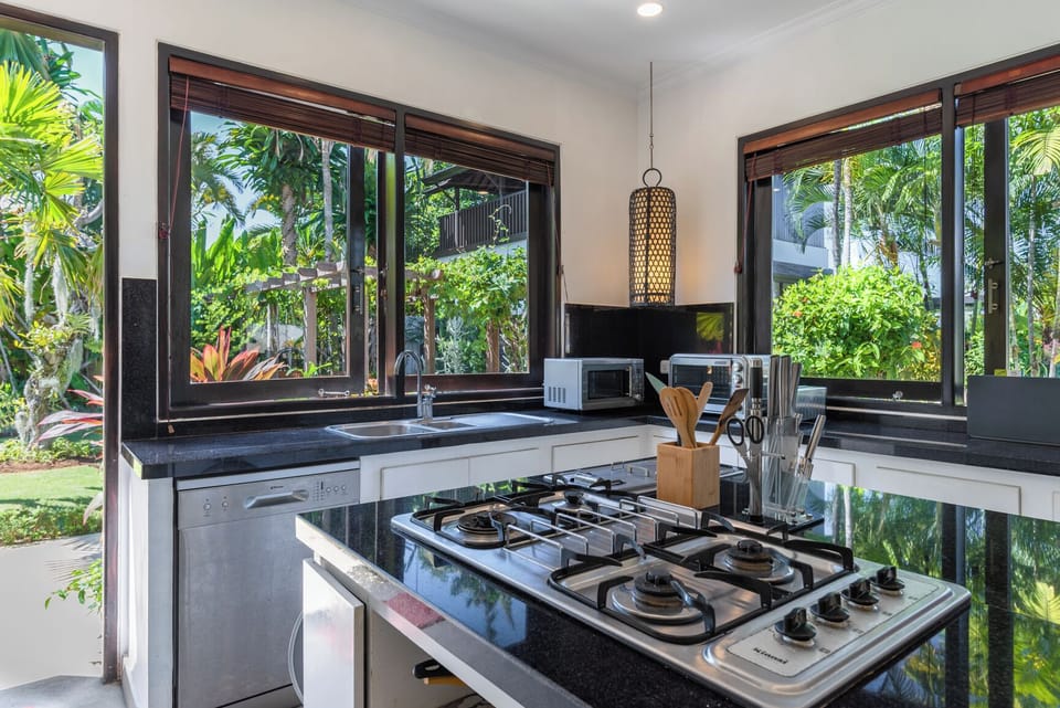 Electric kettle, highchair, cleaning supplies, paper towels