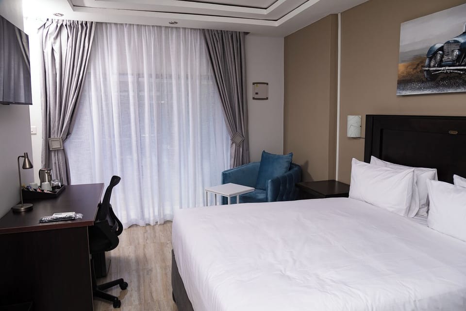 Standard Room, 1 Bedroom | In-room safe, iron/ironing board, free WiFi