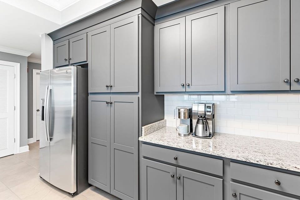 Condo, 4 Bedrooms | Private kitchen | Fridge, oven, coffee/tea maker