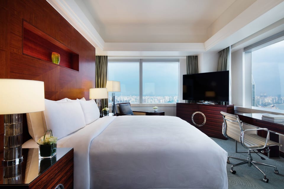 Premium bedding, down comforters, minibar, in-room safe
