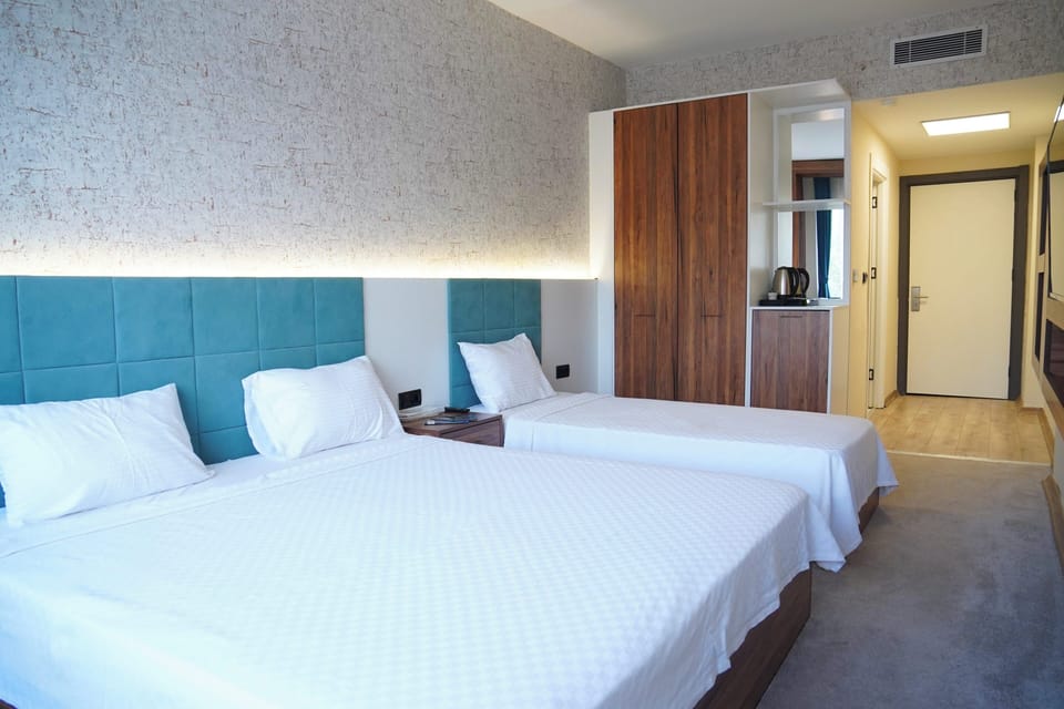 Triple Room | Egyptian cotton sheets, premium bedding, down comforters, minibar