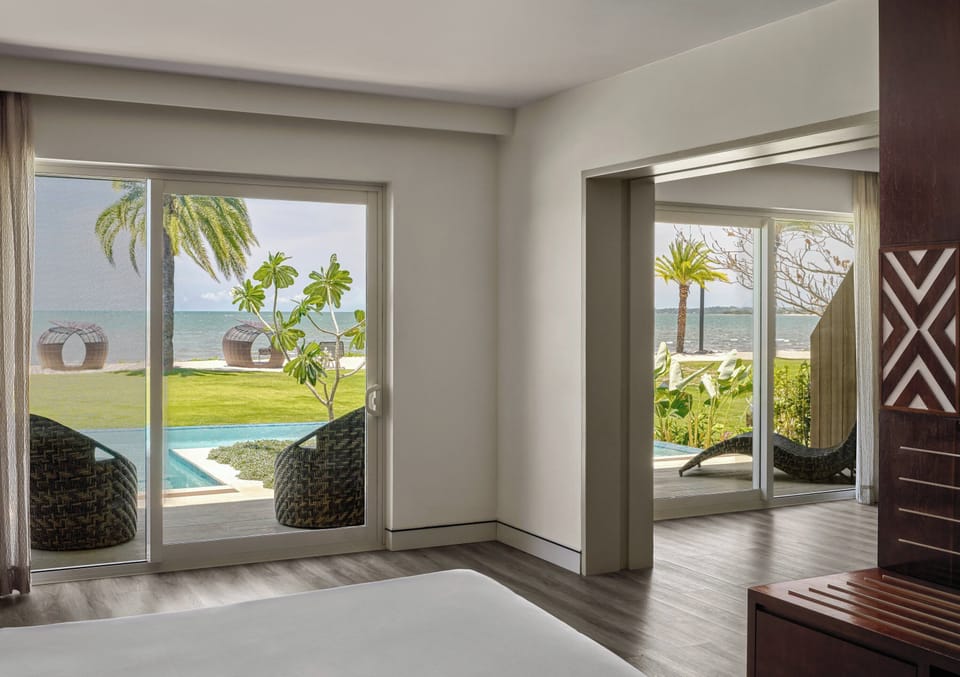 Junior Suite, 1 King Bed, Pool Access, Ocean View | Down comforters, minibar, in-room safe, individually decorated
