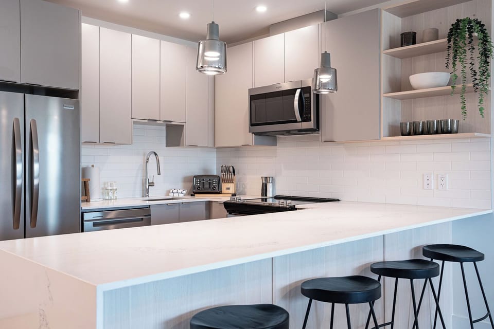 Condo | Private kitchen | Coffee/tea maker, full-size fridge, microwave, oven