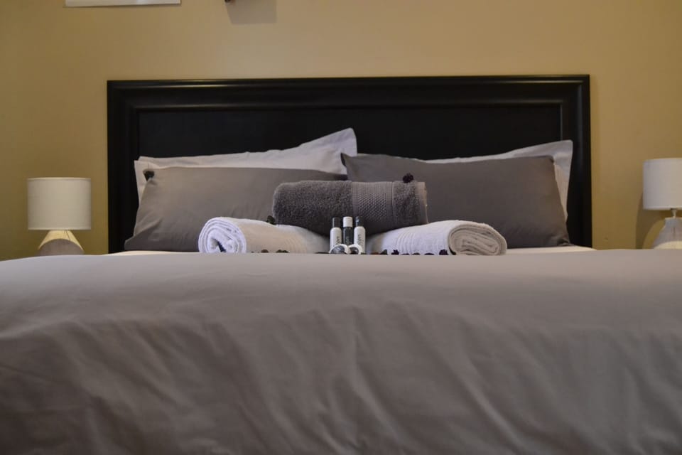 Down comforters, pillowtop beds, in-room safe, desk