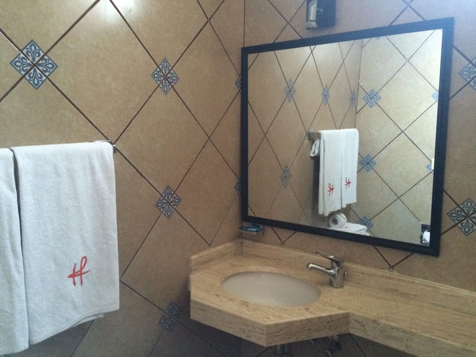 Shower, free toiletries, hair dryer (on request), towels