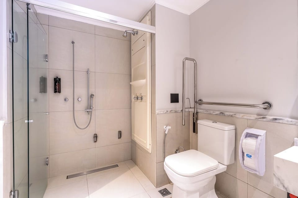 Standard Triple, 1 Double Bed and 1 Single Bed (Accessible) | Bathroom | Shower, free toiletries, hair dryer, towels