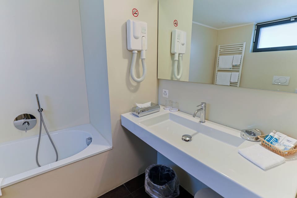 Panorama Deluxe, Balcony | Bathroom | Hair dryer, slippers, towels, soap