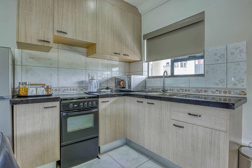 Standard Double Room, 1 Queen Bed | Private kitchen | Mini-fridge, electric kettle