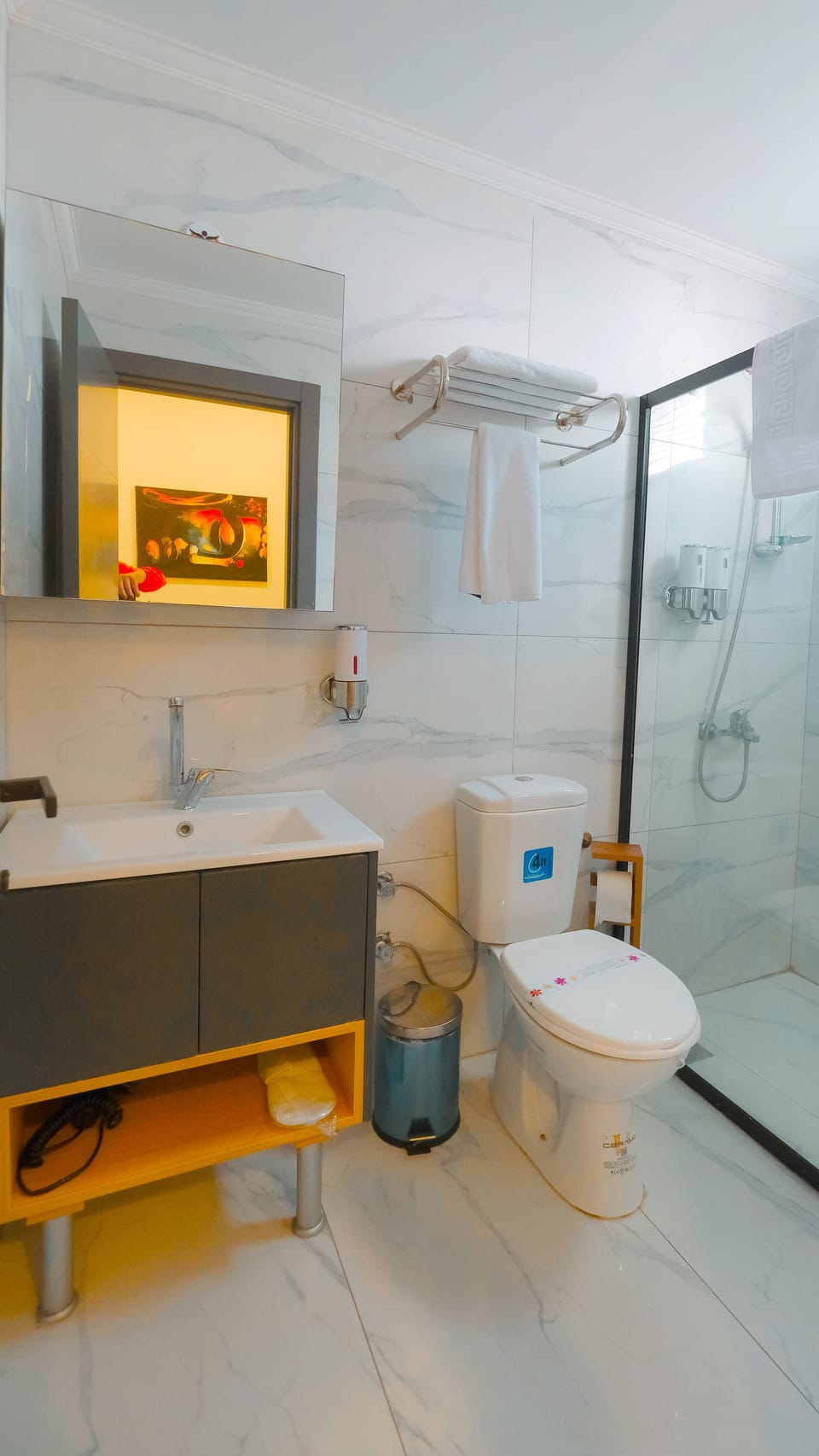 Shower, rainfall showerhead, designer toiletries, hair dryer