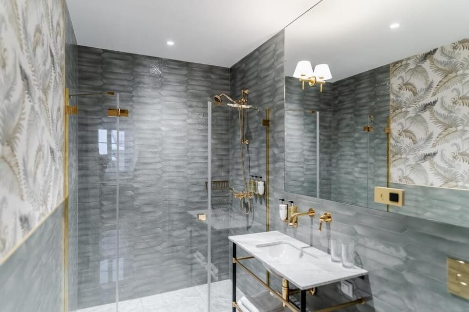 Deluxe Double Room | Bathroom | Designer toiletries, hair dryer, bathrobes, slippers