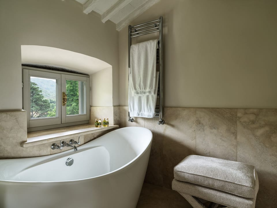 Designer toiletries, hair dryer, bathrobes, slippers