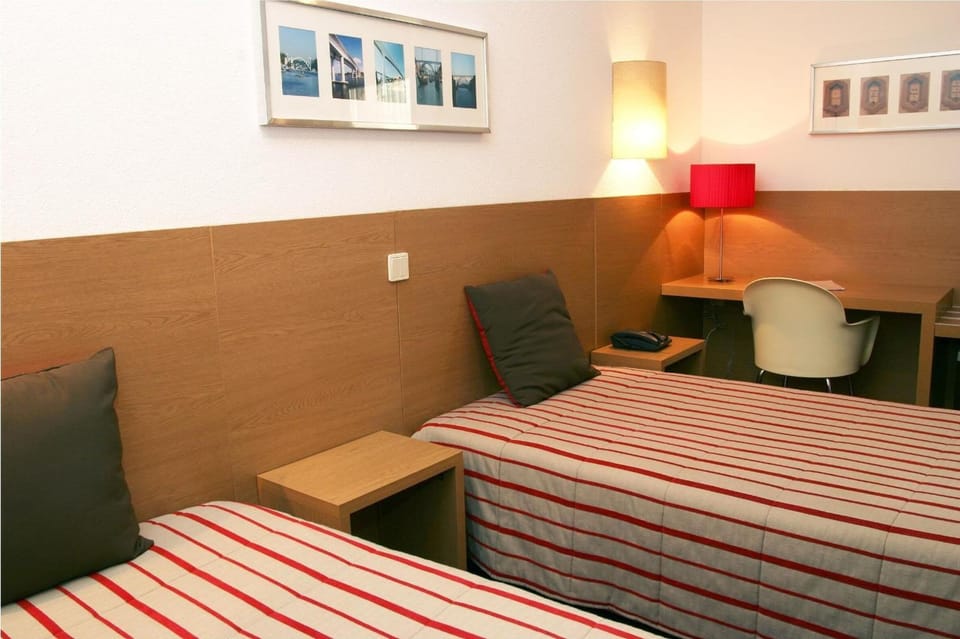 Double Room | Minibar, in-room safe, desk, laptop workspace