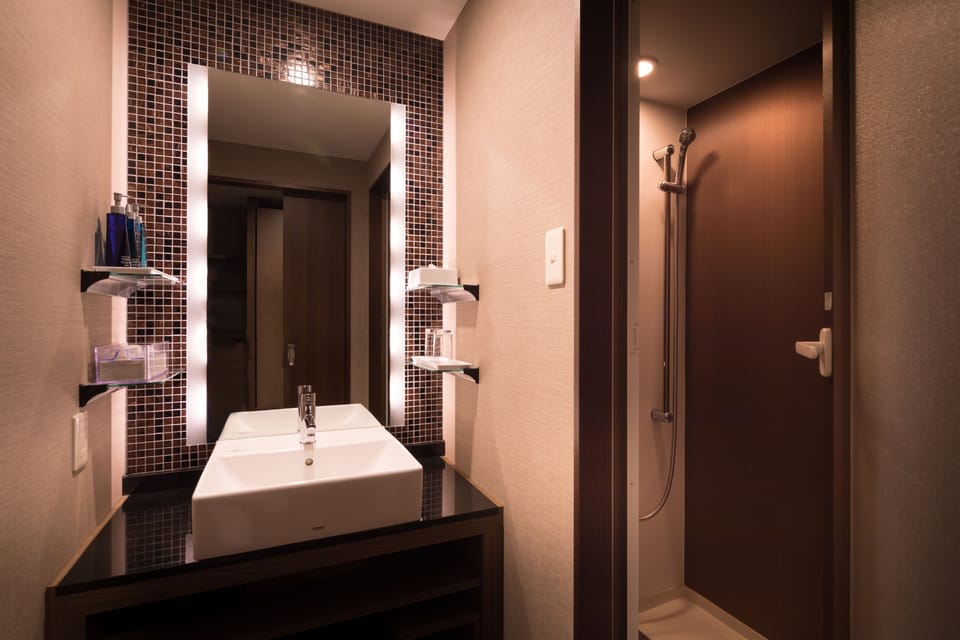 Twin Room A, Non Smoking | Bathroom | Free toiletries, hair dryer, slippers, bidet