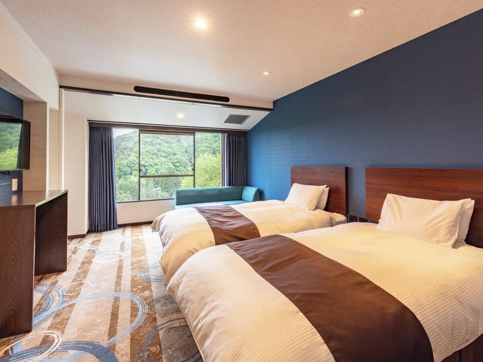 Twin Room, Non Smoking (B) | In-room safe, desk, free WiFi, bed sheets
