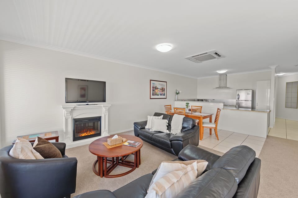 Standard Apartment, 1 Bedroom, Non Smoking, Kitchen (Ocean Apartment) | Living area | Flat-screen TV, DVD player