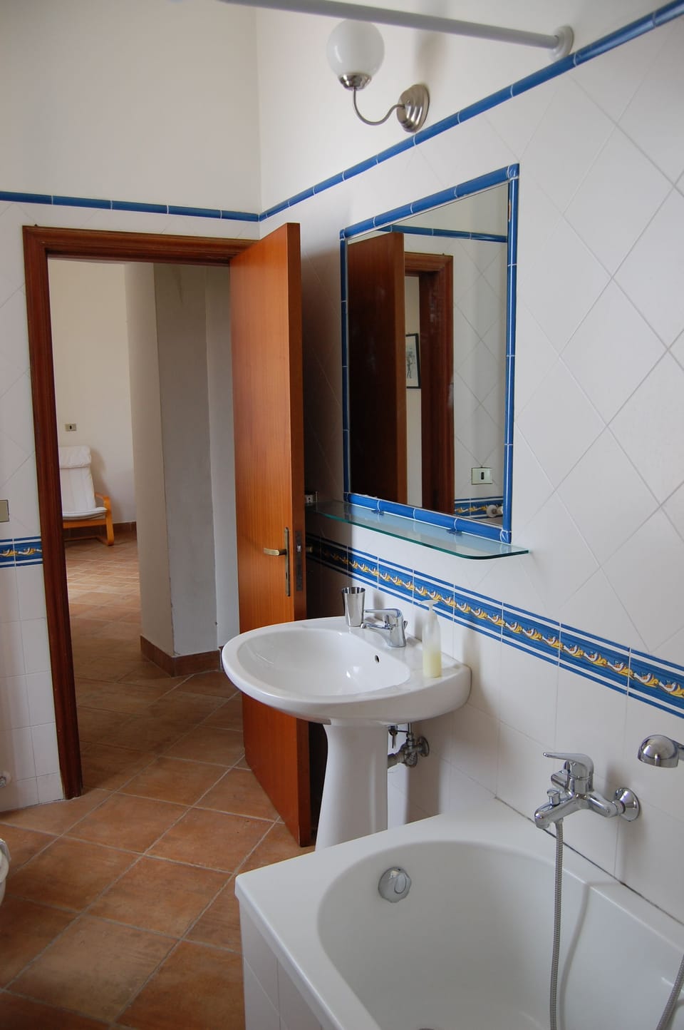 Basic Apartment, Kitchen, Courtyard View | Bathroom | Shower, hair dryer, bidet, towels