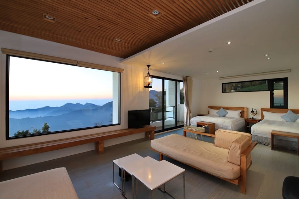 Modern style building- Deluxe Quadruple Room, 2 Queen Beds, Balcony  | Premium bedding, laptop workspace, soundproofing, free WiFi