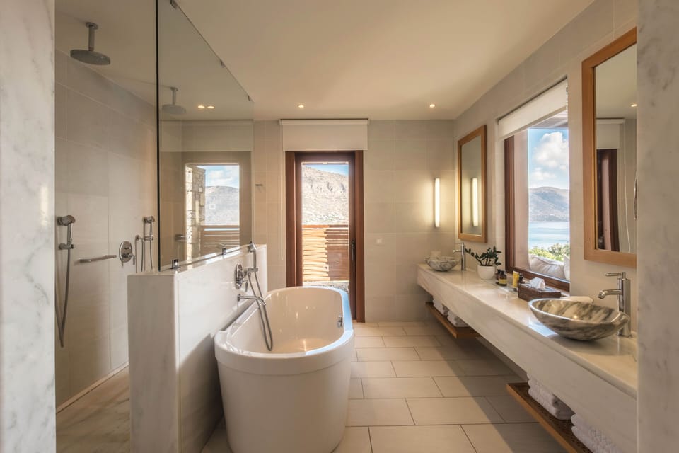 Suite, Sea View (Island, Private Heated Pool) | Bathroom | Eco-friendly toiletries, hair dryer, bathrobes, slippers