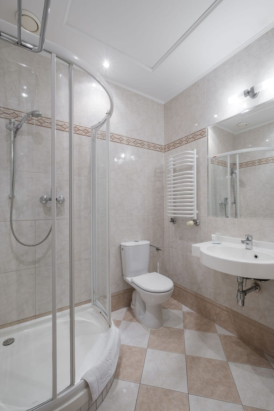 Shower, free toiletries, hair dryer, towels
