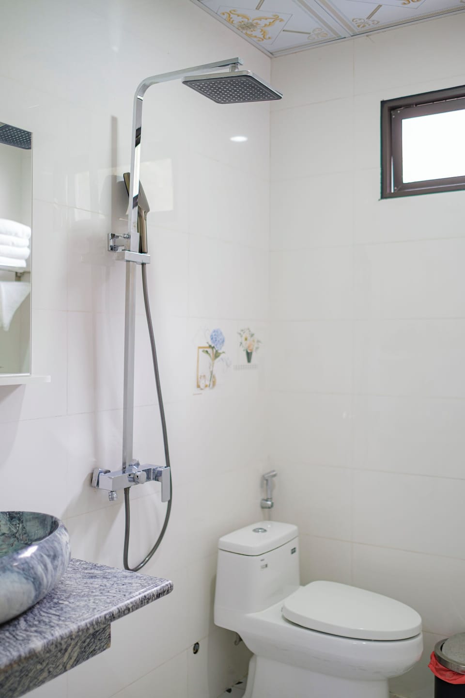 Family Room | Bathroom | Rainfall showerhead, free toiletries, hair dryer, slippers
