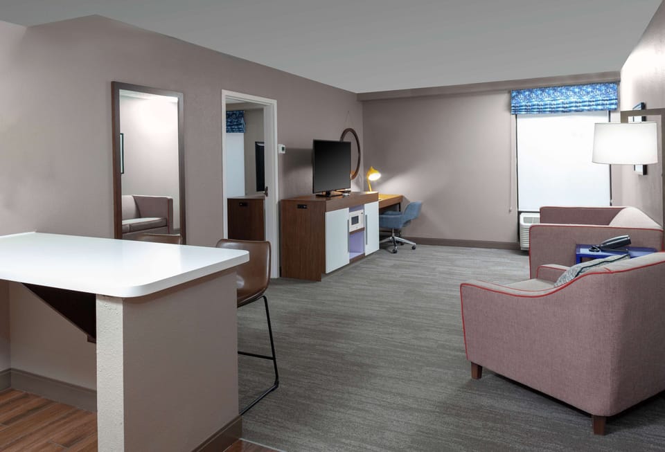 Premium bedding, down comforters, pillowtop beds, desk