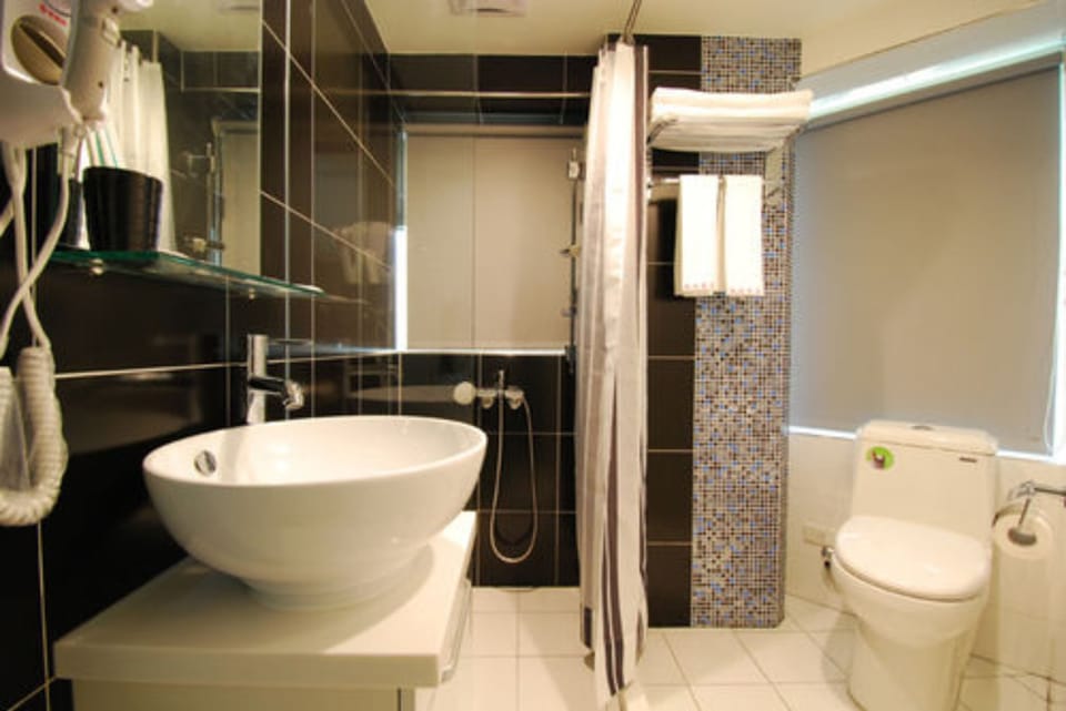 Shower, free toiletries, hair dryer, slippers