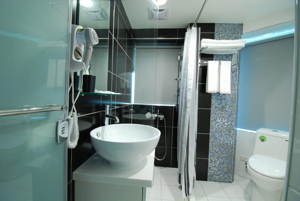 Shower, free toiletries, hair dryer, slippers