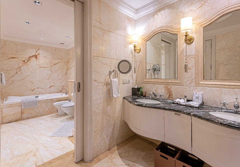 Suite, Non Smoking (Willingdon Crescent) | Bathroom | Designer toiletries, hair dryer, bathrobes, slippers