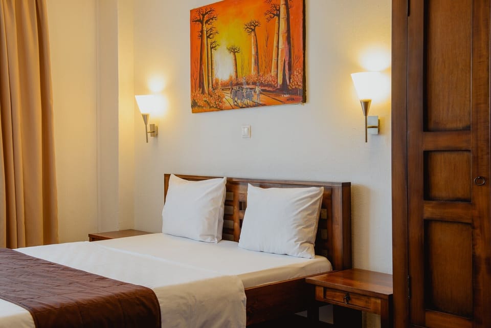 Standard Double Room | Minibar, individually decorated, individually furnished, desk