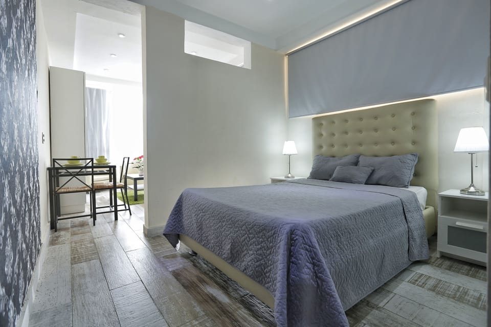 Junior Suite, 1 Bedroom, Kitchenette, Sea View | Minibar, in-room safe, desk, blackout drapes