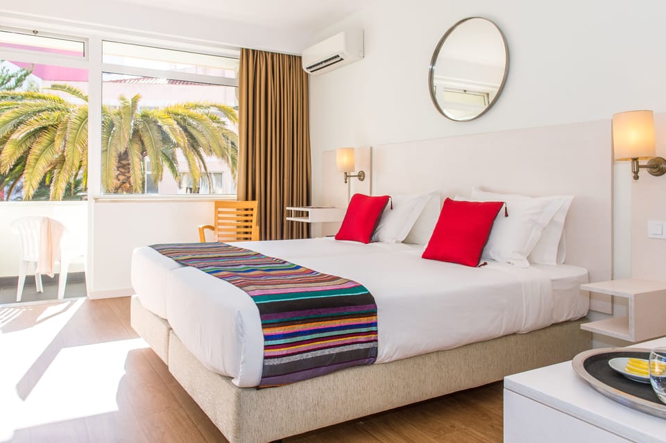 Double or Twin Room, Balcony (Pool or Garden View) | In-room safe, desk, blackout drapes, free WiFi