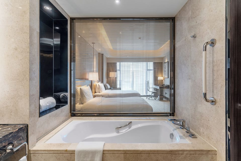 Economy Twin Room | Bathroom | Separate tub and shower, deep soaking tub, rainfall showerhead