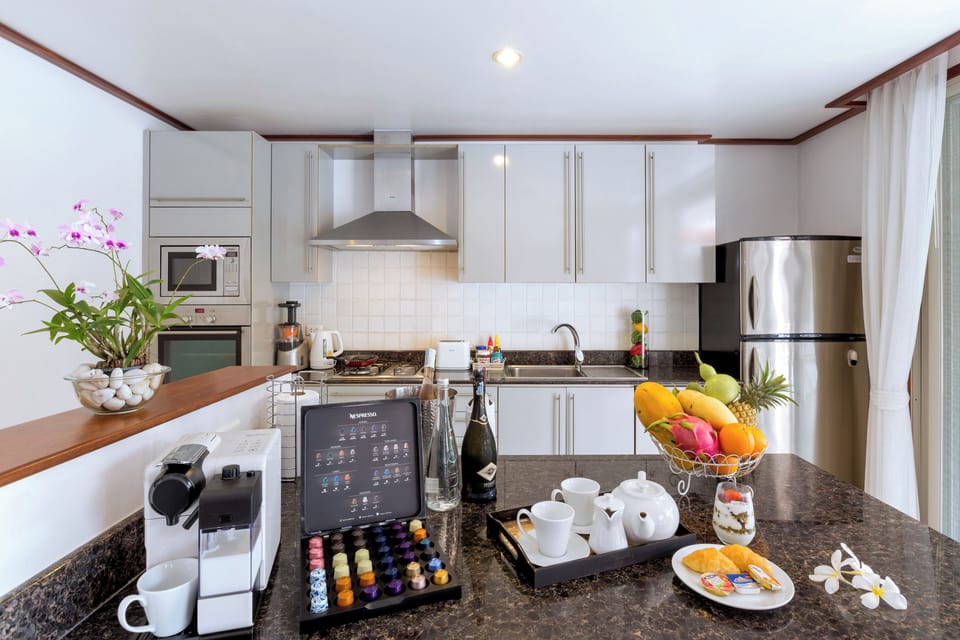 Villa | Private kitchen | Fridge, microwave, oven, stovetop