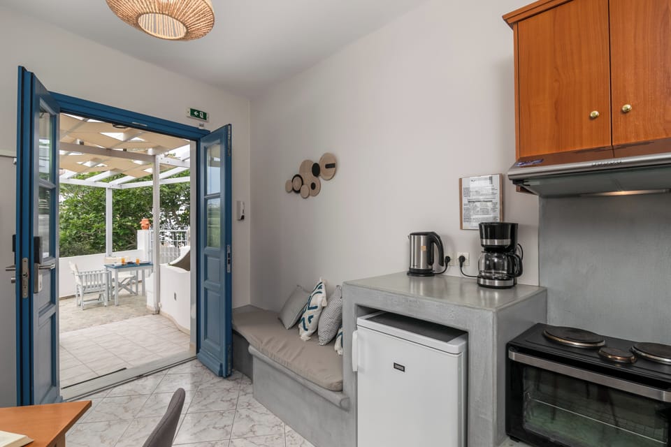 Superior Apartment, 2 Bedrooms | Private kitchen | Fridge, stovetop, coffee/tea maker, electric kettle