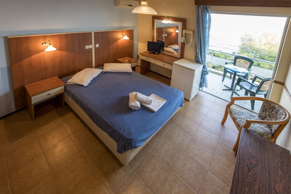 Desk, iron/ironing board, free cribs/infant beds, bed sheets