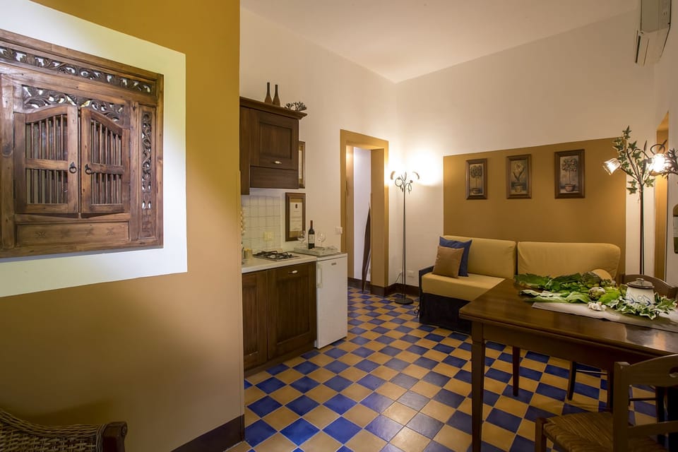 Apartment, 1 Bedroom | Living room | Flat-screen TV