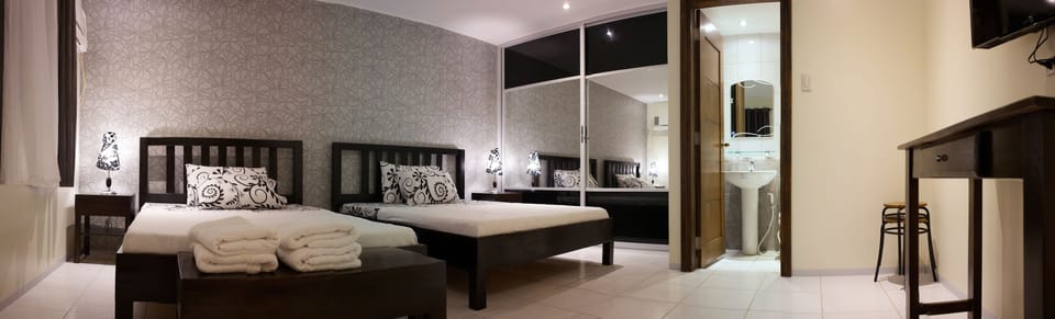 Standard Quadruple Room | Laptop workspace, iron/ironing board, free WiFi, bed sheets