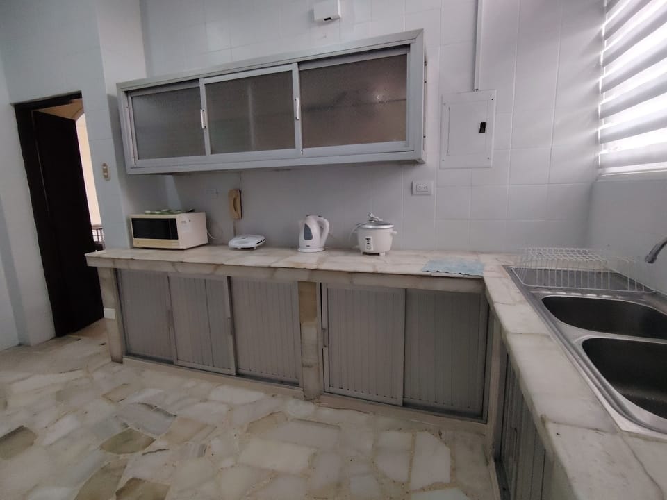 Coffee/tea maker, full-size fridge, cookware/dishes/utensils